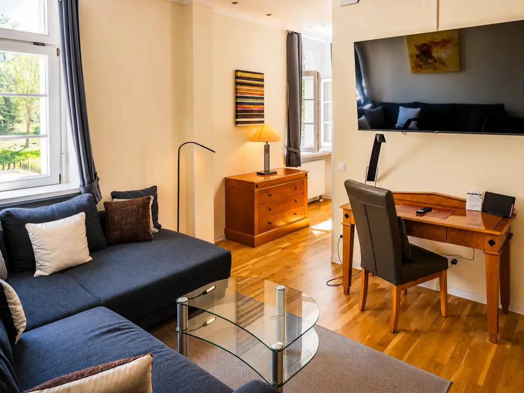 Cosy, bright family room at Schlosshotel Domäne Walberberg.